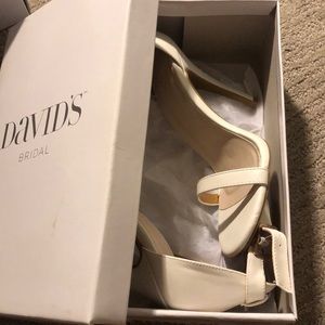 Cream Strappy high heels.